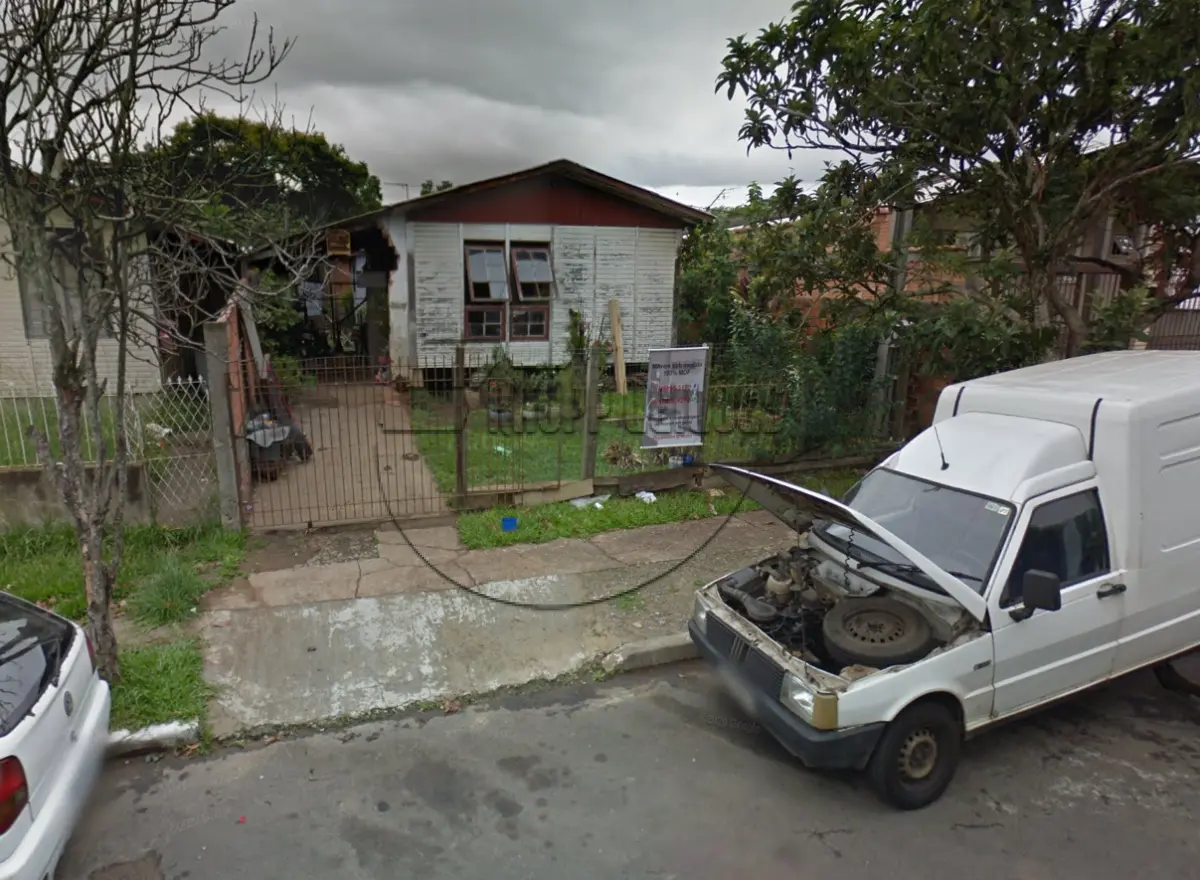 LOTE 002 - (GRAVATAÍ/RS) Uma casa de madeira na Morada do Vale I, sobre um terreno c/ 300m²