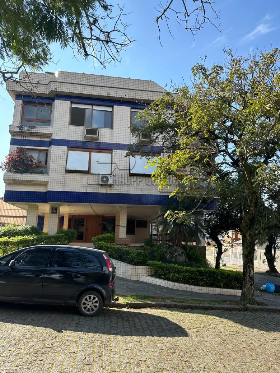 LOTE 014 - (PORTO ALEGRE/RS) O apto 202, c/ 121,68m² + 02 boxes de estacionamento, todos do Edifício Kaiambá  - Bairro Jardim Lindóia