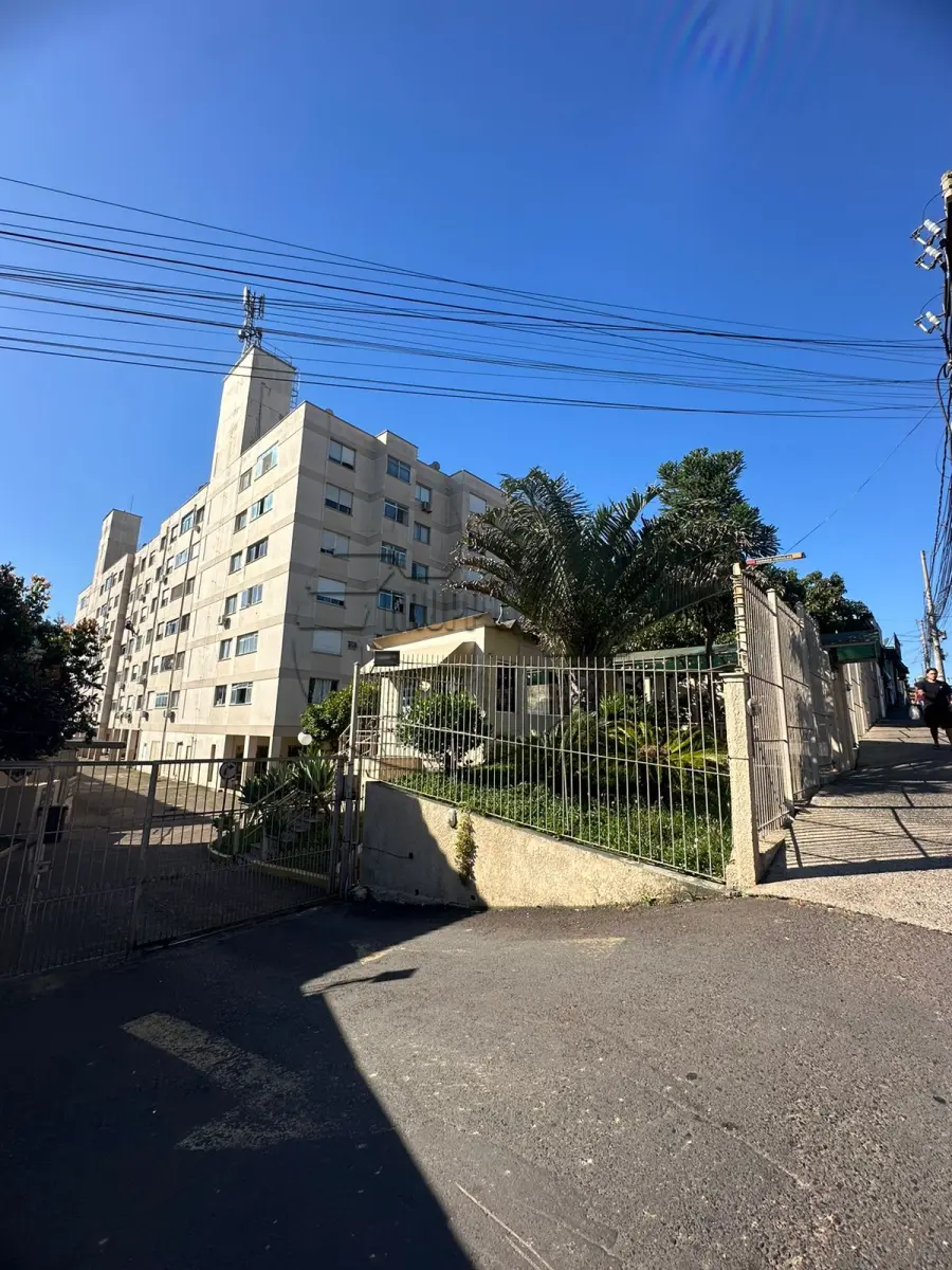 LOTE 001 - 02ª DATA | (PORTO ALEGRE/RS) O apartamento 221, setor C, c/ 57,91m² + O estacionamento 2, c/ 12,00m², ambos do Ed. Vale Verde - Bairro Santa Tereza
