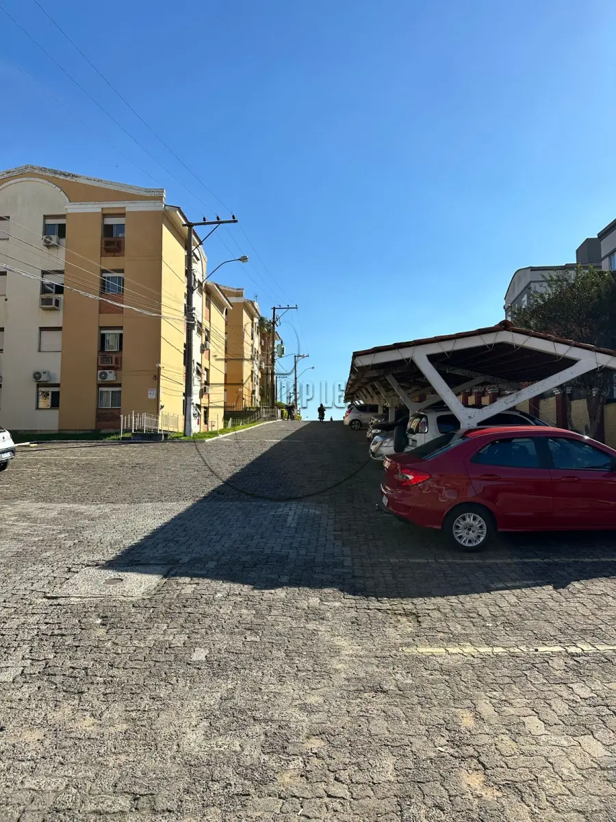 LOTE 008 - (GRAVATAÍ/RS) O apartamento 203, c/ 55,59m², bloco 09, do Cond. Resid. Village Center, no Bairro Passo das Pedras