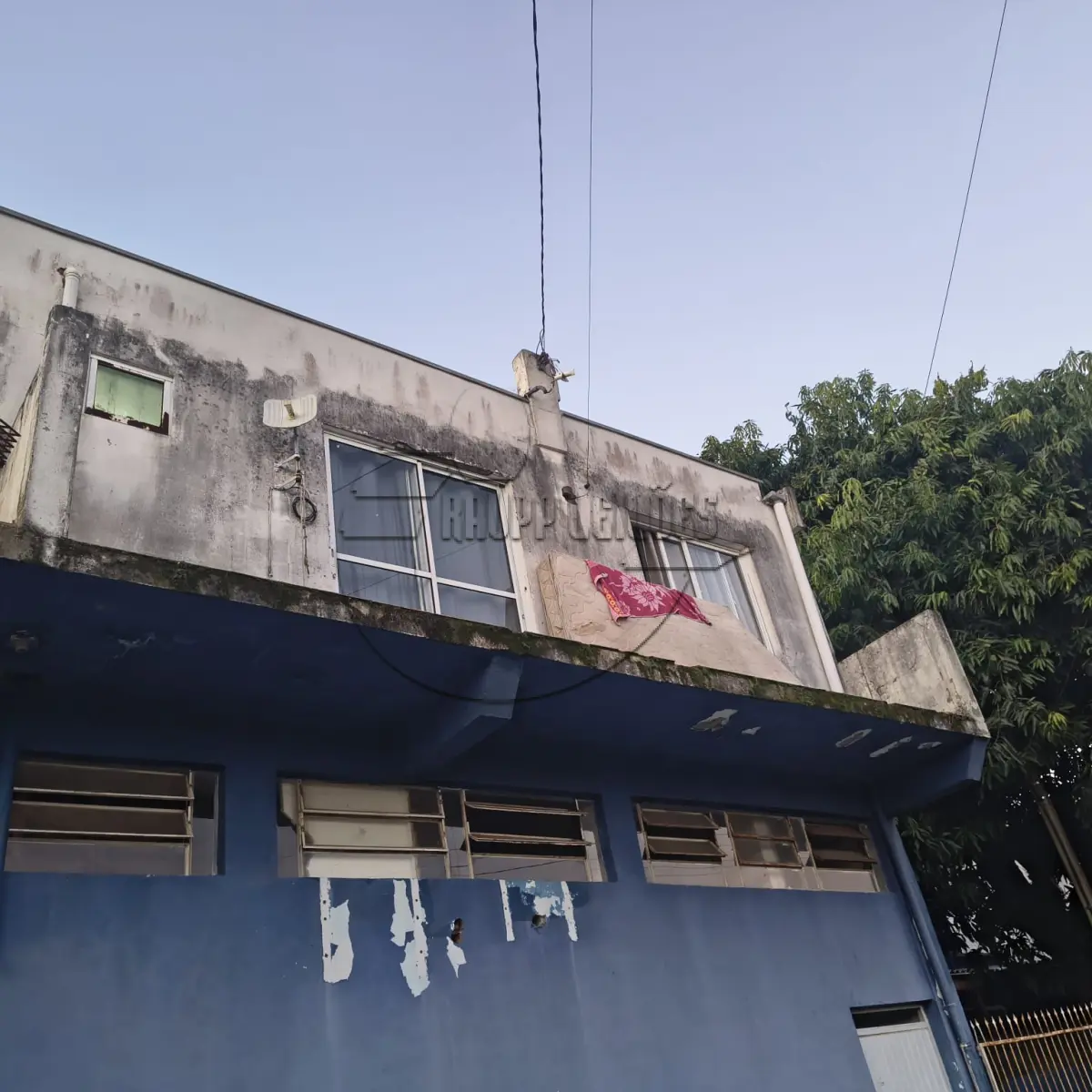 LOTE 006 - (ESTEIO/RS) Uma construção em alvenaria c/ 02 pavimentos, no Bairro Parque Primavera