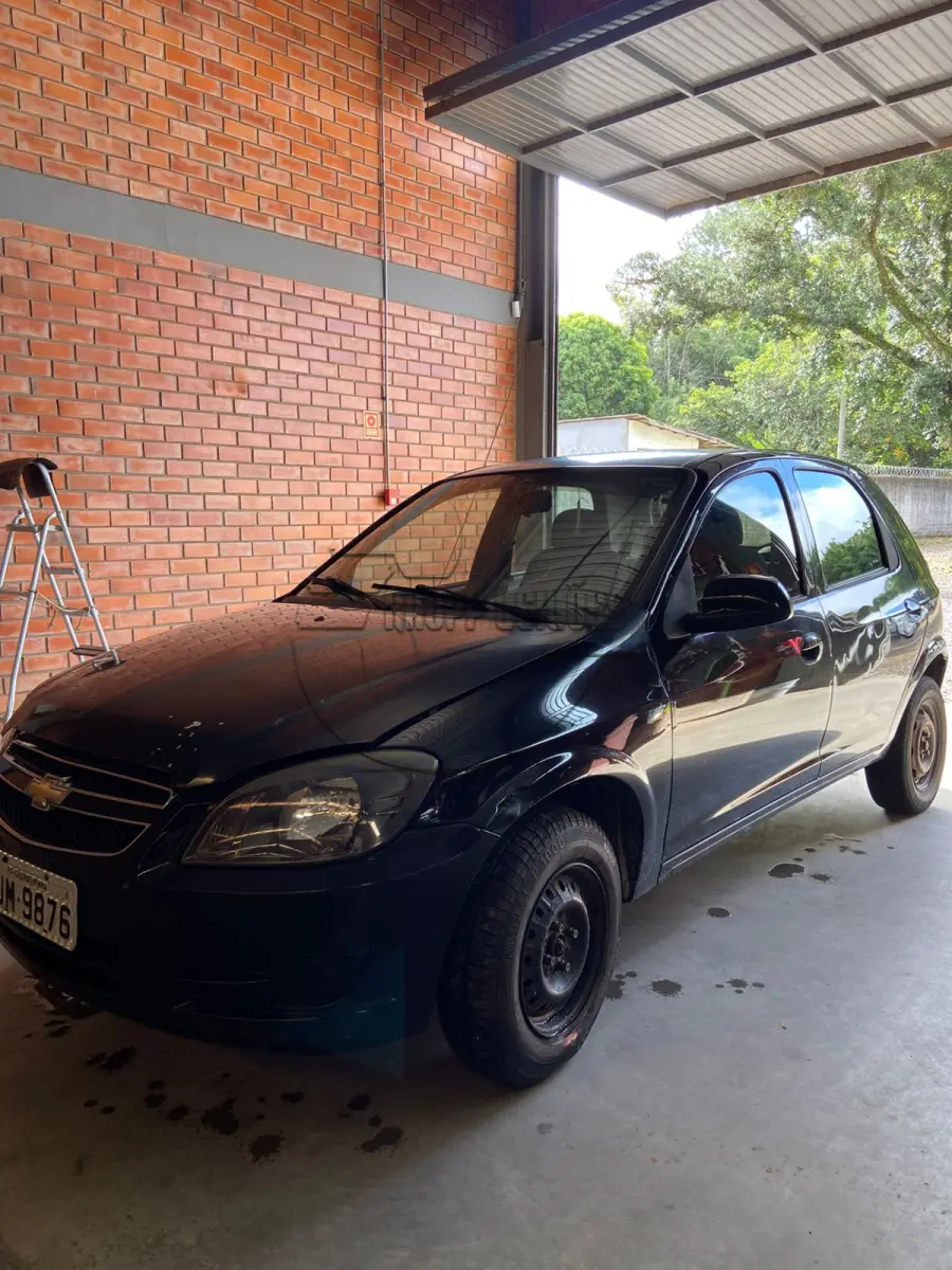 LOTE 009 - Um veículo CHEVROLET/CELTA 1.0L LT,  ano/modelo 2013/2014