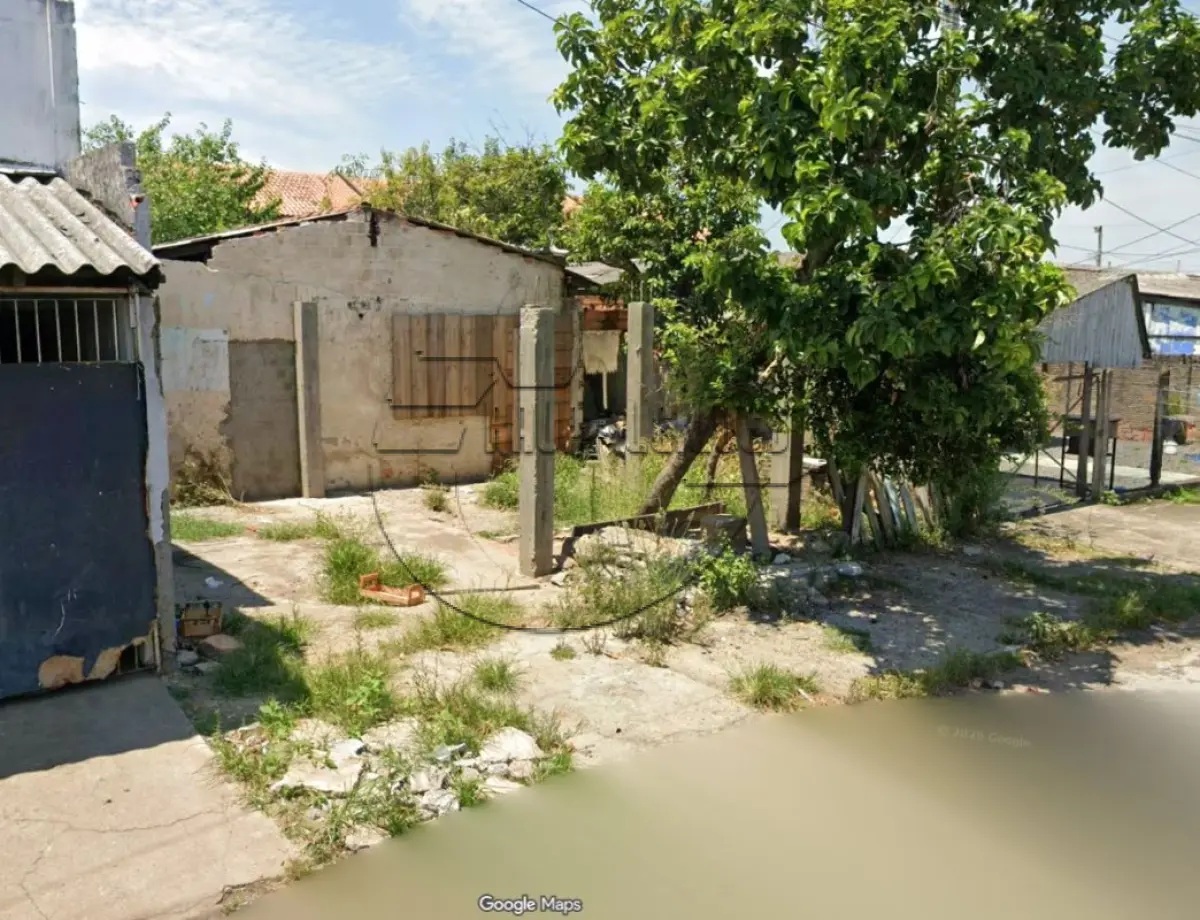 **(gravataí/rs) um terreno urbano c/ benfeitorias, no bairro vila rica