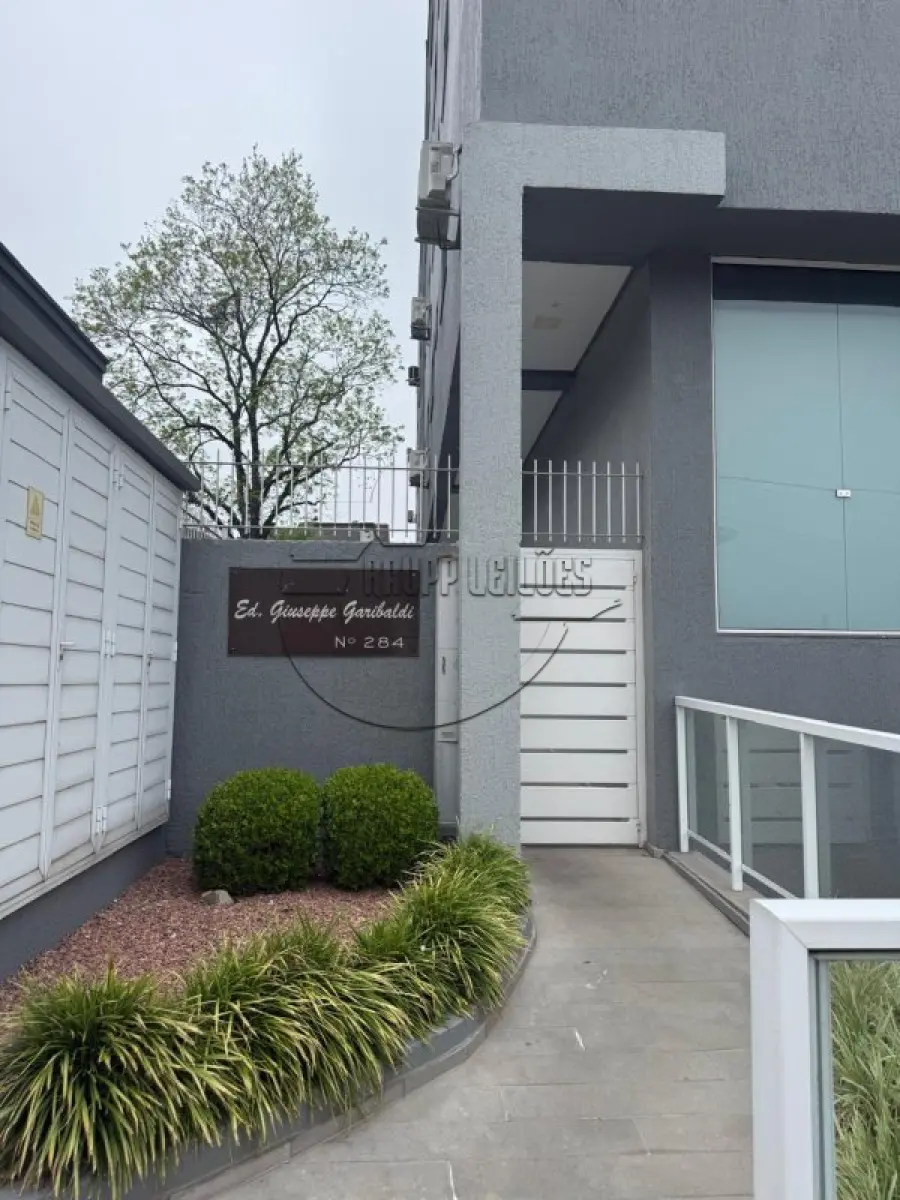 LOTE 016 - (GARIBALDI/RS) Sala comercial c/ 159,04m² + 02 vagas de estacionamento, todos do Edifício Residencial Giuseppe Garibaldi, no Bairro Ferroviário