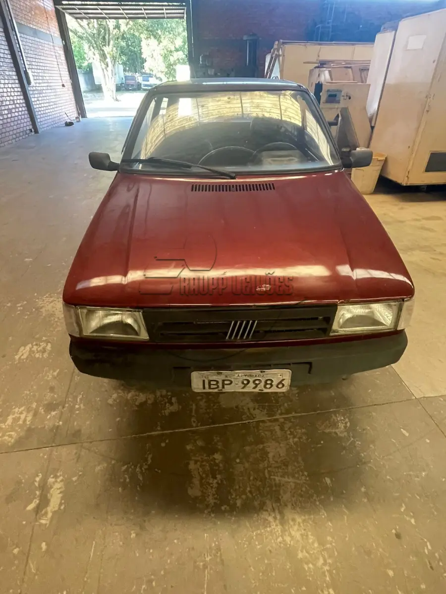 LOTE 013 - Um veículo Fiat/Uno Electronic, placa IBP9986