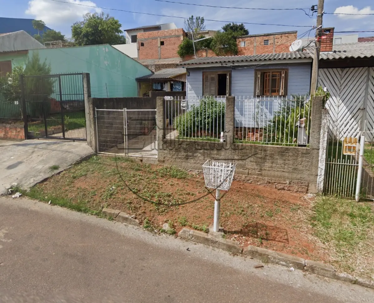 LOTE 008 - (ALVORADA/RS) Uma casa de madeira, em regular estado de conservação, no Bairro Jardim Algarve