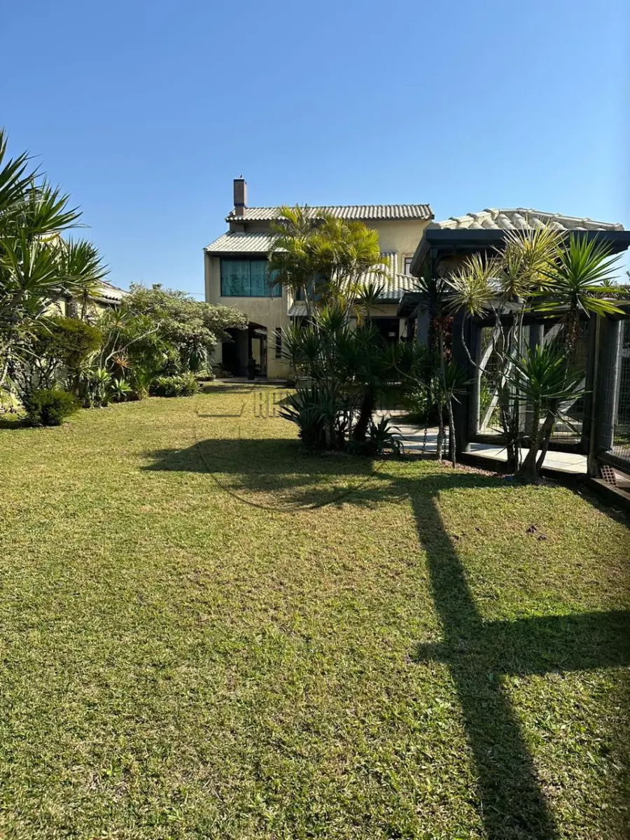 LOTE 001 - 02ª DATA | (XANGRI-LÁ/RS) 02 terrenos somando 720,00m², c/ 01 casa de alvenaria de aprox. 160,50m², na Praia do Arpoador