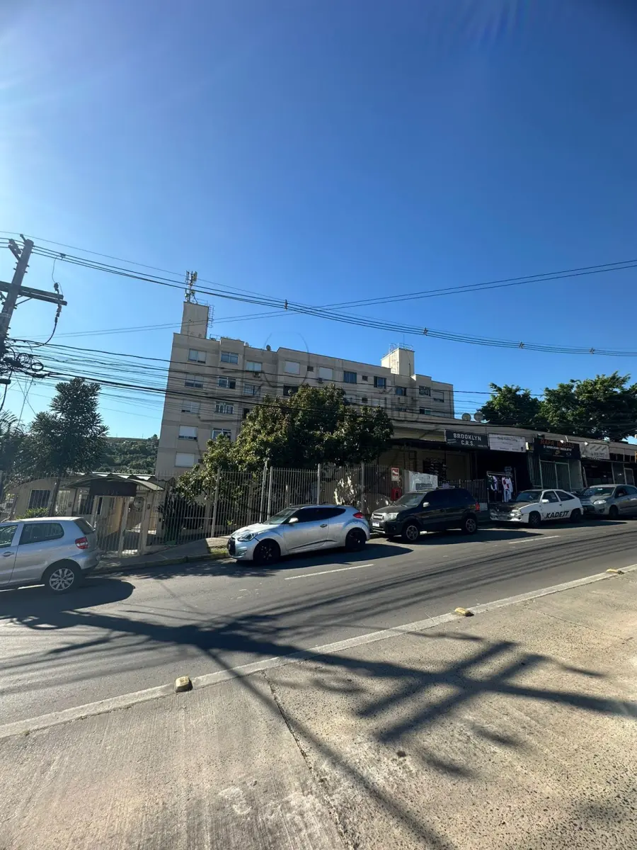 LOTE 001 - 02ª DATA | (PORTO ALEGRE/RS) O apartamento 221, setor C, c/ 57,91m² + O estacionamento 2, c/ 12,00m², ambos do Ed. Vale Verde - Bairro Santa Tereza