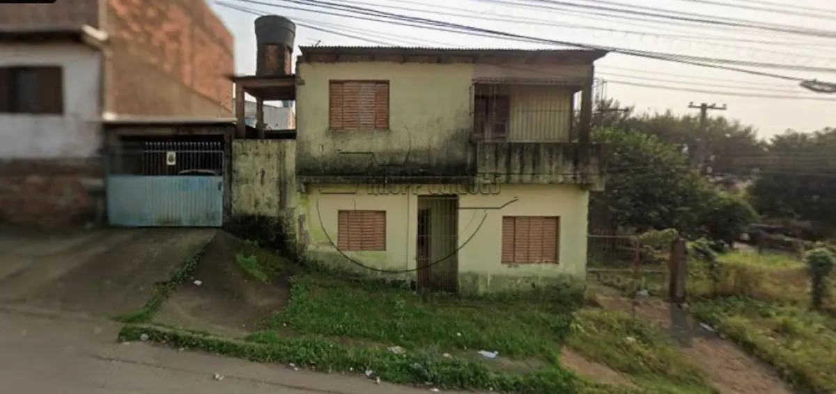 LOTE 007 - 02ª DATA | (ALVORADA/RS) Um terreno de esquina, c/ 286,74m², possuindo benfeitorias, no Bairro Bela Vista