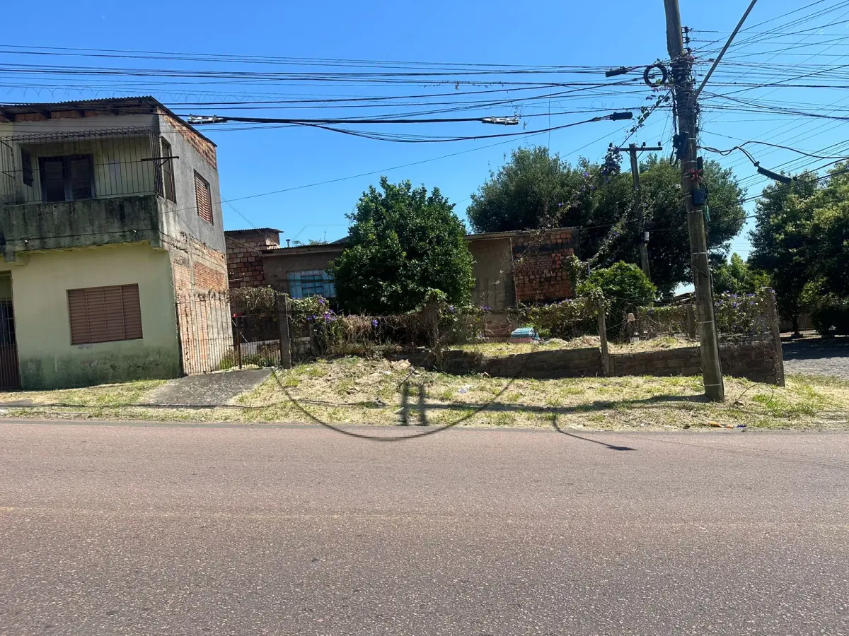 LOTE 007 - 02ª DATA | (ALVORADA/RS) Um terreno de esquina, c/ 286,74m², possuindo benfeitorias, no Bairro Bela Vista