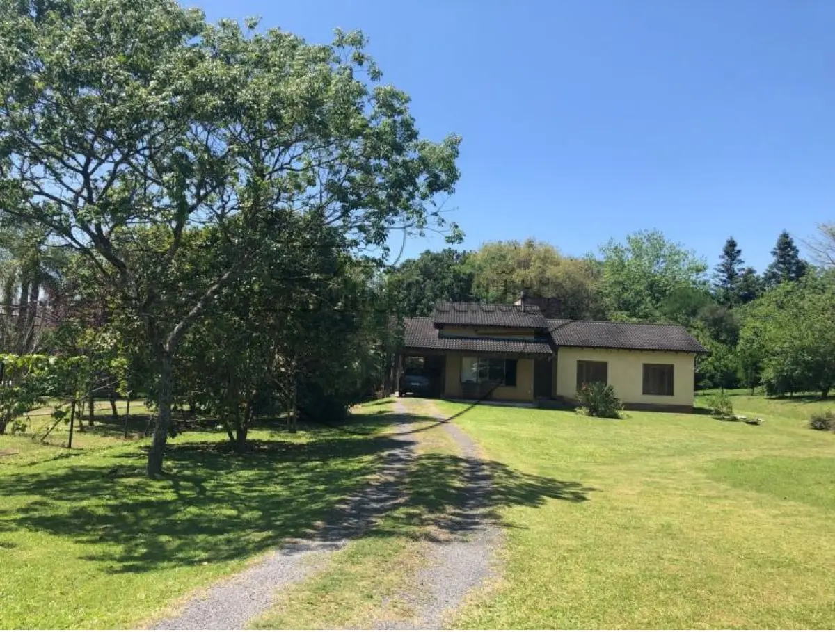 LOTE 005 - 02ª DATA | (GRAVATAÍ/RS) A unidade 370 do Condomínio Paragem dos Verdes Campos, que correspoonde a um terreno de 1.500,00m², c/ uma residência