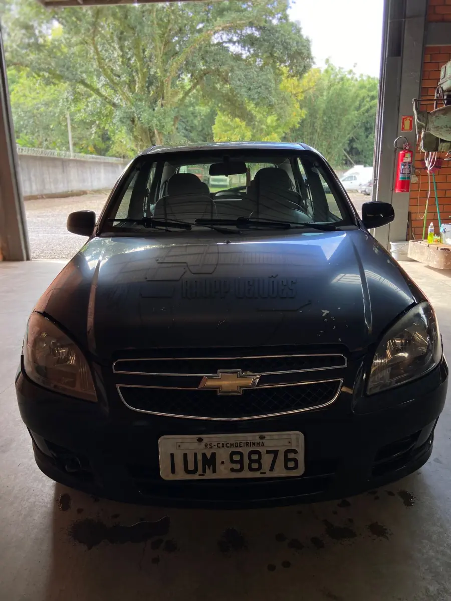 LOTE 009 - Um veículo CHEVROLET/CELTA 1.0L LT,  ano/modelo 2013/2014