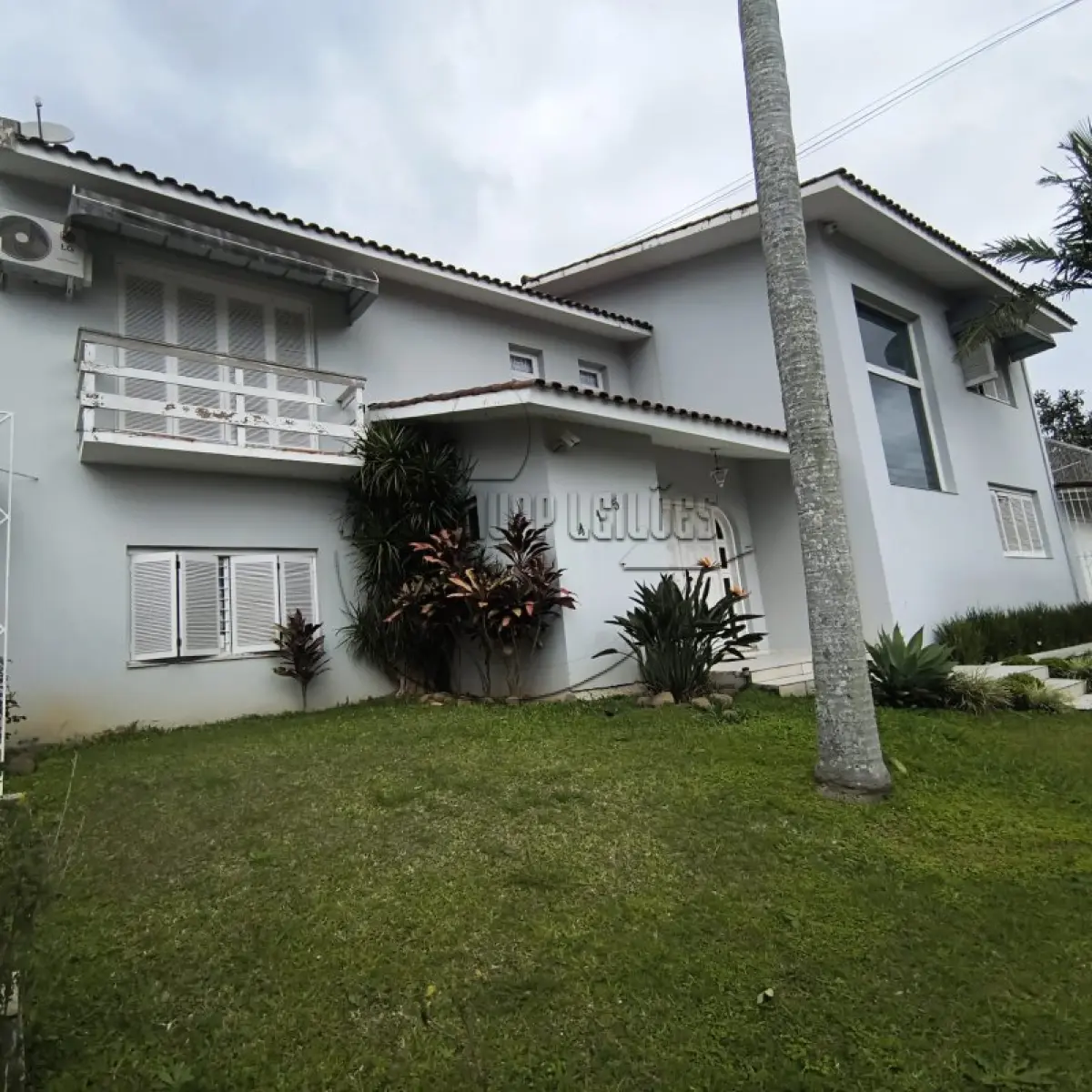 LOTE 005 - (PORTO ALEGRE/RS) Uma casa de alvenaria, no Bairro Parque Santa Fé