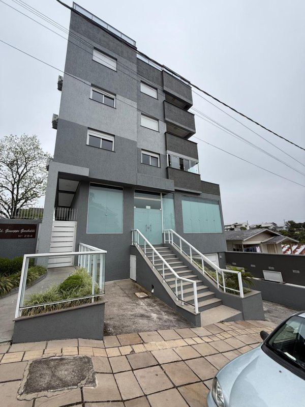 LOTE 016 - (GARIBALDI/RS) Sala comercial c/ 159,04m² + 02 vagas de estacionamento, todos do Edifício Residencial Giuseppe Garibaldi, no Bairro Ferroviário